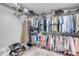 Walk-in closet with lots of hanging space, wire shelves and carpet at 544 Bottlebrush Ct, New Smyrna Beach, FL 32168