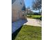 Home exterior with brick facade, manicured lawn, and outdoor patio at 5832 Michelle Ln, Sanford, FL 32771