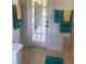 Bathroom featuring a door to the outside and a small cabinet at 5832 Michelle Ln, Sanford, FL 32771