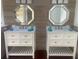 Bathroom featuring double vanity with marble countertop and decorative mirrors at 5832 Michelle Ln, Sanford, FL 32771