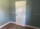 Bedroom featuring wood laminate flooring and neutral paint at 5832 Michelle Ln, Sanford, FL 32771