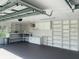 Spacious garage with ample storage shelving and cabinets at 5832 Michelle Ln, Sanford, FL 32771