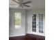 Bright living room featuring french doors and a large window at 5832 Michelle Ln, Sanford, FL 32771