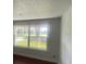 Living Room with a window looking out onto a lawn and trees at 5832 Michelle Ln, Sanford, FL 32771