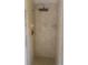 Walk-in shower with tiled walls, shower head and glass enclosure at 5832 Michelle Ln, Sanford, FL 32771