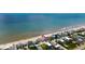 Beautiful aerial view of a beach house near the ocean, perfect for a relaxing vacation at 6883 S Atlantic Ave, New Smyrna Beach, FL 32169