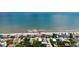 Charming aerial view of the beach house, perfectly located near the ocean and coastline at 6883 S Atlantic Ave, New Smyrna Beach, FL 32169