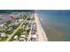 Beautiful aerial view shows the beach house and coastline, with JB's Fishcamp in the distance at 6883 S Atlantic Ave, New Smyrna Beach, FL 32169