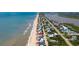 Scenic aerial view showcases the beach house's coastal location near the ocean at 6883 S Atlantic Ave, New Smyrna Beach, FL 32169