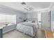 Inviting bedroom with ocean views, beach-themed decor, and light blue walls at 6883 S Atlantic Ave, New Smyrna Beach, FL 32169