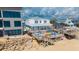 Beautiful beach house with multiple decks and ocean views, perfect for coastal living at 6883 S Atlantic Ave, New Smyrna Beach, FL 32169