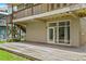 Exterior featuring a wooden deck and a doorway leading to the home interior at 6956 Turtlemound Rd, New Smyrna Beach, FL 32169