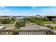 Rooftop deck view with a gorgeous neighborhood and the ocean in the background at 6956 Turtlemound Rd, New Smyrna Beach, FL 32169