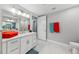 Bathroom featuring white vanity, large mirror, toilet, and contemporary finishes at 7 Riverwalk Dr # 305, New Smyrna Beach, FL 32169