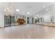 Expansive living room features ample natural light, tile floors, and a decorative fireplace at 757 Hunt Club Trl, Port Orange, FL 32127