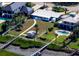 Beautiful waterfront property with well-maintained lawns, a small pool, and private dock access at 8 Richmond Dr, New Smyrna Beach, FL 32169