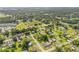 Lovely aerial view of a charming neighborhood with tree-lined streets and well-maintained homes at 805 Spruce St, New Smyrna Beach, FL 32168