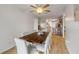 Bright dining room with modern wood table, contemporary decor and open access to kitchen at 805 Spruce St, New Smyrna Beach, FL 32168