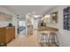 Bright kitchen with stainless steel appliances, breakfast bar, and stylish fixtures at 805 Spruce St, New Smyrna Beach, FL 32168