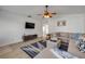 Inviting living room with modern decor, comfortable seating, and sleek entertainment center at 805 Spruce St, New Smyrna Beach, FL 32168