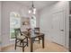 Cozy dining area with tile flooring and natural light, adjacent to kitchen at 850 Wingate Trl, Port Orange, FL 32128