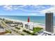 Aerial view of the building with beach access, a pool, tennis courts and gorgeous waterfront at 901 S Atlantic Ave # 202, Ormond Beach, FL 32176