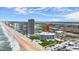 Aerial view of the building with beach access, a pool and gorgeous waterfront at 901 S Atlantic Ave # 202, Ormond Beach, FL 32176