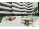 Beautiful atrium features water feature, comfortable seating, and an abundance of natural light at 901 S Atlantic Ave # 202, Ormond Beach, FL 32176
