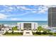 Beautiful oceanfront condo building, lush landscaping, and inviting entryway at 901 S Atlantic Ave # 202, Ormond Beach, FL 32176