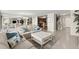 Spacious living room with views of dining area and kitchen at 901 S Atlantic Ave # 202, Ormond Beach, FL 32176
