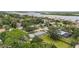 Aerial view of a cozy neighborhood near a waterway, offering a scenic and tranquil setting at 132 E Turgot Ave, Edgewater, FL 32132