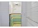 Hall bathroom features tiled shower and shower head at 132 E Turgot Ave, Edgewater, FL 32132
