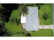 Aerial view of the home showcasing the roof, yard, and surrounding greenery at 1903 Willow Oak Dr, Edgewater, FL 32141