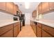 Functional kitchen featuring appliances, cabinets, and ample counter space at 1903 Willow Oak Dr, Edgewater, FL 32141