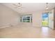 Bright living room with a bay window and neutral carpeting at 1903 Willow Oak Dr, Edgewater, FL 32141