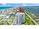 Expansive aerial view of a condo building near the beach and intercoastal waterway at 2 Oceans West Blvd # 206, Daytona Beach Shores, FL 32118