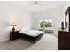 Bedroom featuring a mattress and natural light from the slider at 2 Oceans West Blvd # 206, Daytona Beach Shores, FL 32118