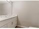 Bathroom featuring a single sink vanity with modern fixtures and quartz countertops at 2005 Sunny Ln, New Smyrna Beach, FL 32168