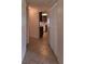 Hallway with tile flooring and a view into the kitchen at 2029 Willow Oak Dr, Edgewater, FL 32141