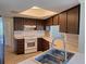 Bright kitchen with ample cabinet space, white appliances, and tile flooring at 2029 Willow Oak Dr, Edgewater, FL 32141