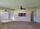 Open concept living area connecting the living room, kitchen, and backyard at 2029 Willow Oak Dr, Edgewater, FL 32141