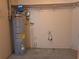A utility room featuring a water heater and some plumbing at 2029 Willow Oak Dr, Edgewater, FL 32141