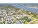 Beautiful aerial view of a riverside neighborhood with mature trees and waterway access at 206 Kirkland Rd, New Smyrna Beach, FL 32169