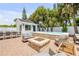 Backyard showcasing a pool, fire pit, and an outdoor seating area at 206 Kirkland Rd, New Smyrna Beach, FL 32169