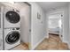 Hallway to bedroom showing in-unit laundry for convenience at 206 Kirkland Rd, New Smyrna Beach, FL 32169