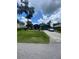 Lovely single story home with manicured front lawn and a paved driveway at 2122 Orange Tree Dr, Edgewater, FL 32141