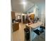 Spacious open kitchen featuring a breakfast bar and tile flooring at 2122 Orange Tree Dr, Edgewater, FL 32141