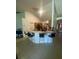 Open kitchen featuring a breakfast bar with seating and tile flooring at 2122 Orange Tree Dr, Edgewater, FL 32141