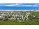 Stunning overhead view of a coastal community with a beautiful ocean view at 22 Sand Dune Dr, New Smyrna Beach, FL 32169