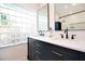 Stylish bathroom featuring double sinks, and modern fixtures at 22 Sand Dune Dr, New Smyrna Beach, FL 32169